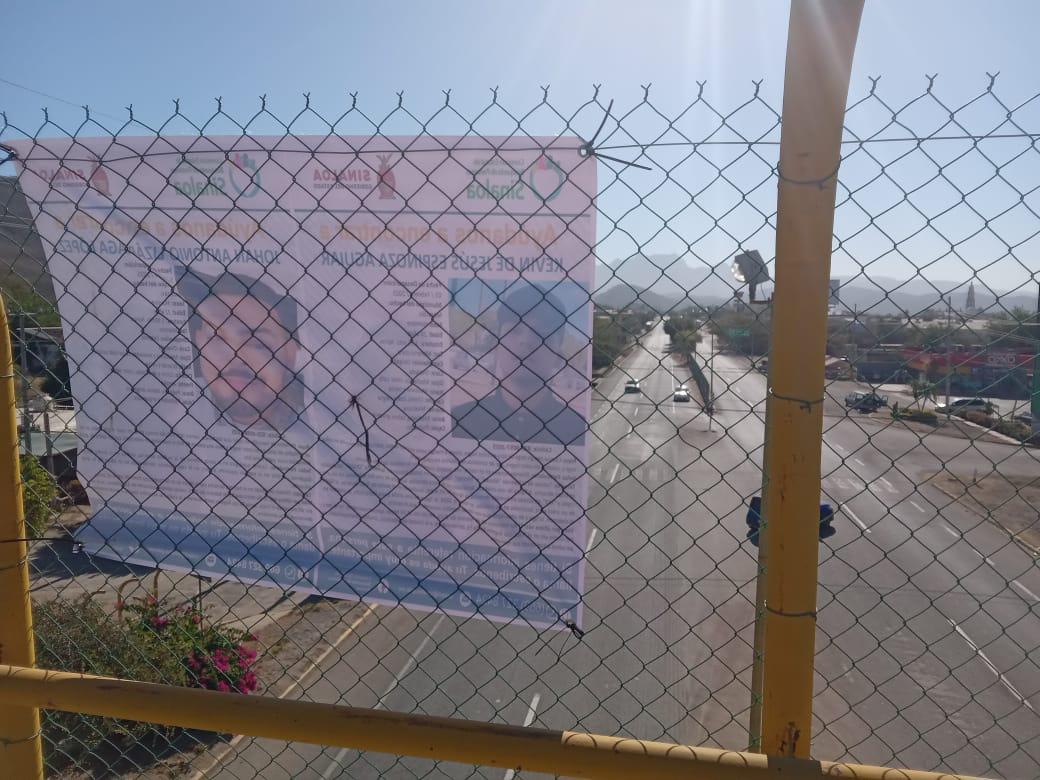 $!Colocan lonas en puentes de Rosario para encontrar a Kevin y Johan