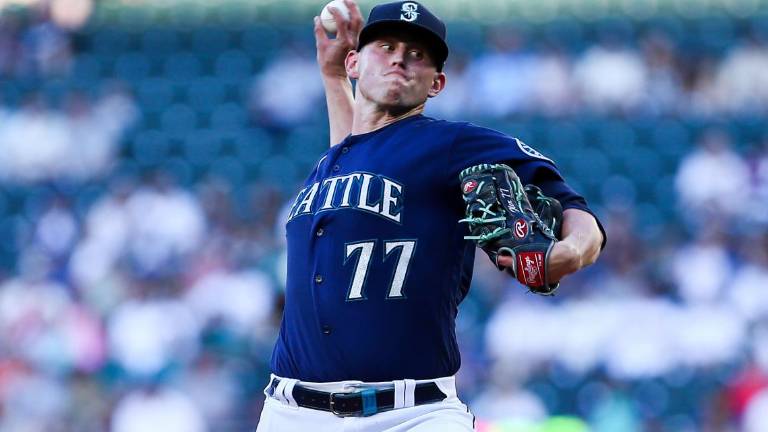 El lanzador Chris Flexen fue adquirido por los Mets, que posteriormente lo dejaron en libertad.