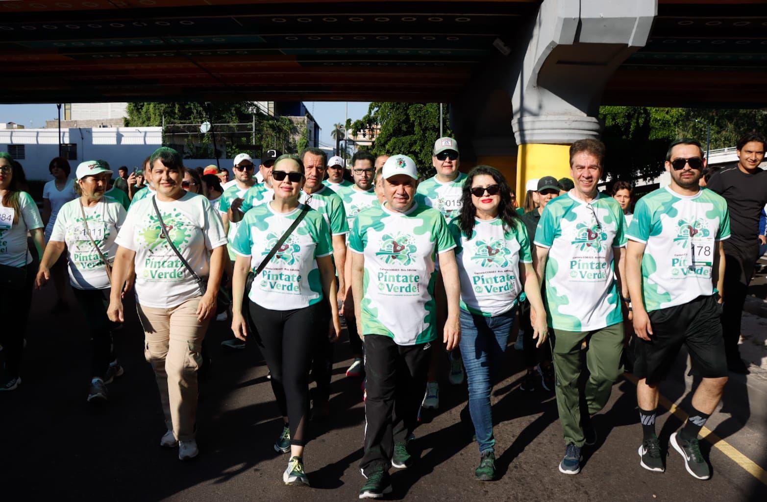 $!Diez mil personas se pintan de verde en carrera del Cobaes