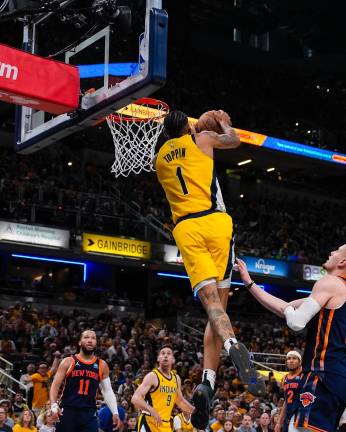 Obi Toppin terminó con 14 puntos.