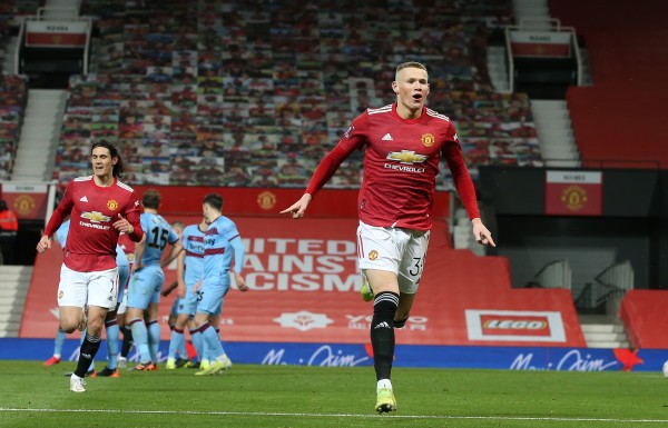 Scott McTominey celebra el gol que le dio el triunfo al Manchester United.