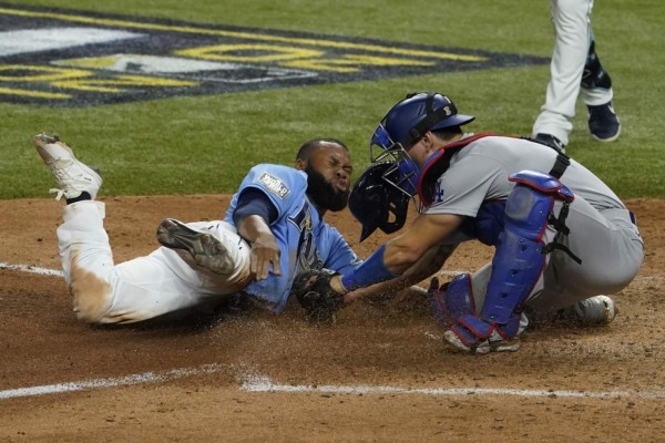 Manuel Margot fue puesto out en un intento de robo de home.