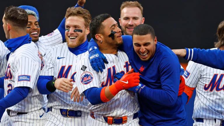 Los Mets celebran su triunfo.