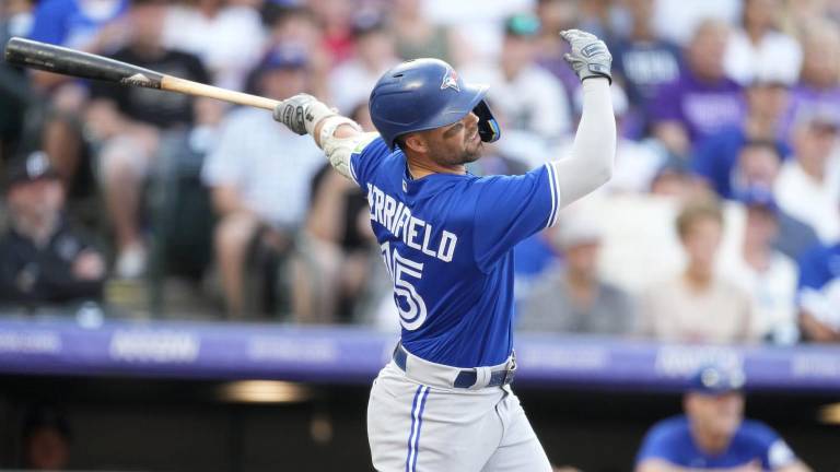 Whit Merrifield llega a Filadelfia.