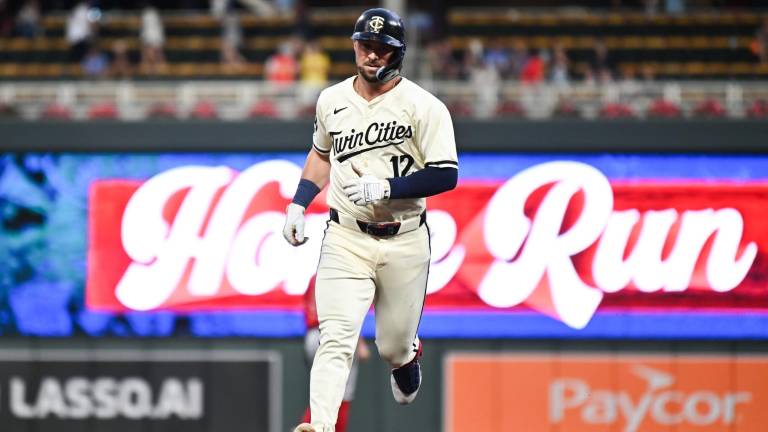 Kyle Farmer pasa a Colorado.