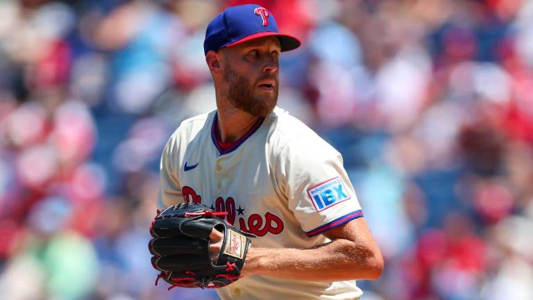 Zack Wheeler lanza juego completo.