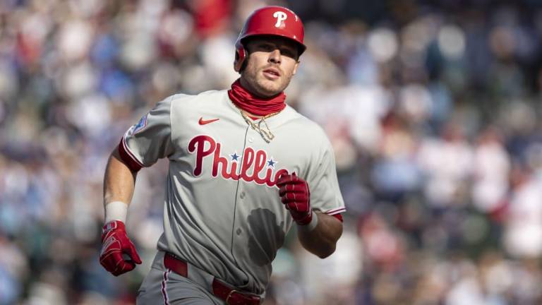 Filis vencen a Cachorros.
