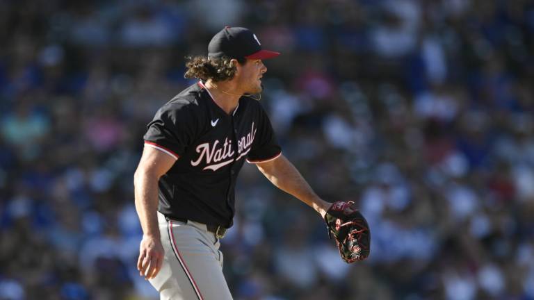Kyle Finnegan permanecerá como parte de los Nacionales.