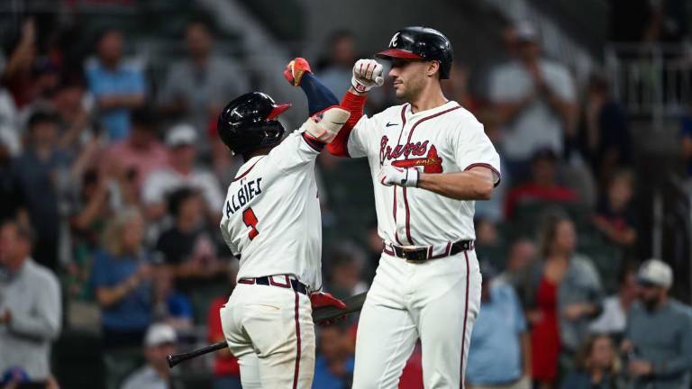 Ozzie Albies y Matt Olson despacharon cuadrangulares por los Bravos.