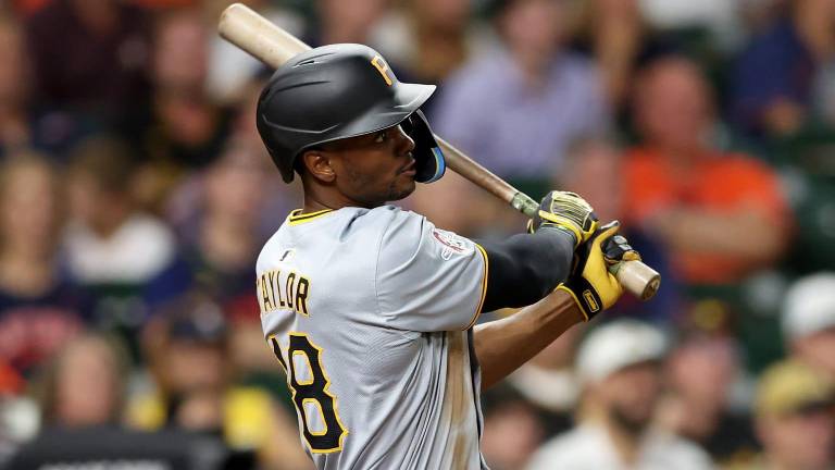 Michael A. Taylor llega a los Medias Blancas de Chicago.