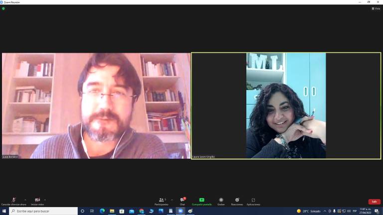 Luca Benassi y la traductora Laura León Virigilio.