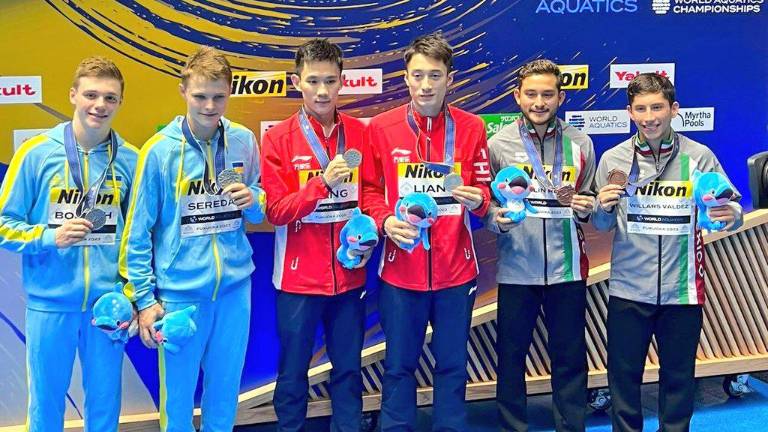 Kevin Berlín y Randal Willars (derecha) se quedaron con el bronce en la plataforma 10m en el Mundial de Fukoka.