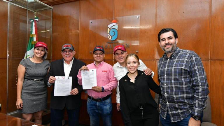 La firma del convenio.