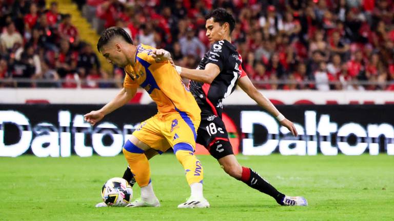 Atlas y Tigres salen tablas.