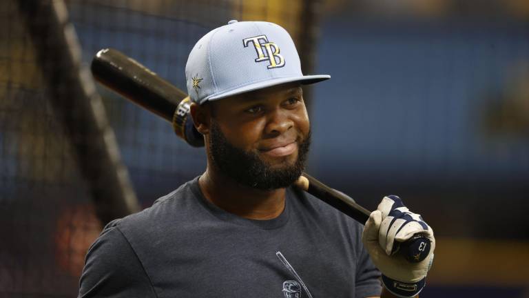 Manuel Margot seguirá con los Rays de Tampa Bay, de acuerdo a reportes.