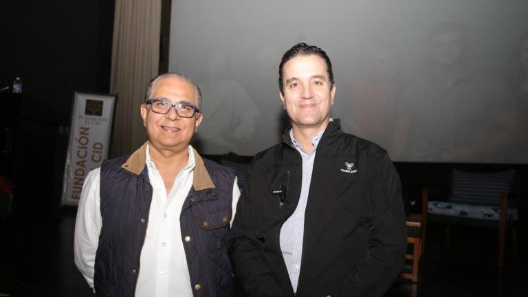 Nicolás Santacruz, director de Recursos Humanos de El Cid Resorts, junto al ponente Luis Gutiérrez Alandro.