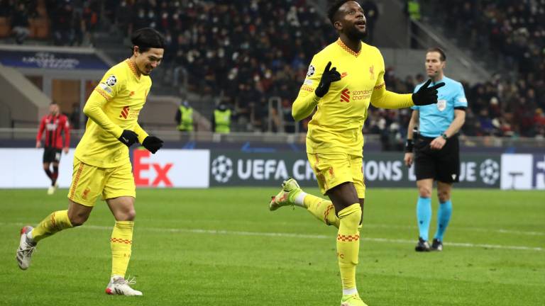 Divock Origi celebra el gol que significó el triunfo del Liverpool ante el AC Milan.