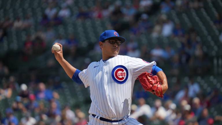 El mexicano Javier Assad debutó en el primer juego de una doble cartelera con los Cachorros de Chicago.