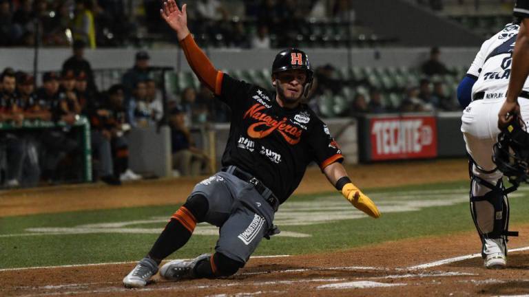 Jasson Atondo anota carrera.