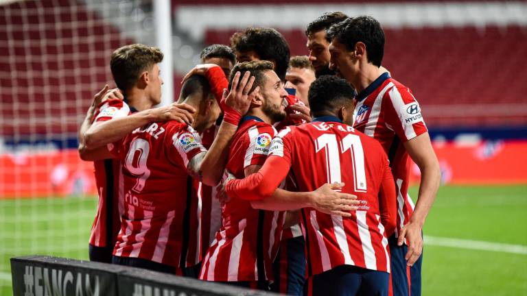 Los colchoneros celebran su triunfo.