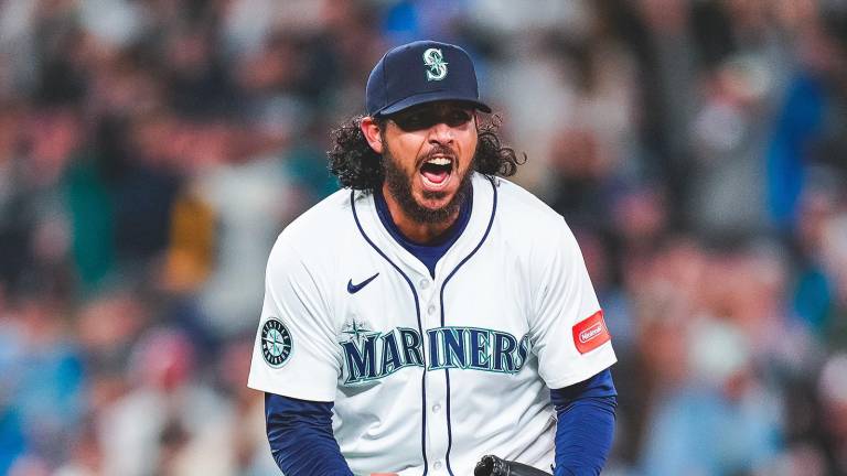 Andrés Muñoz celebra su salvamento.
