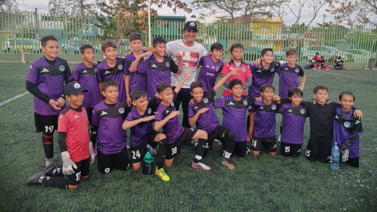 Cañoneros del Colegio SAM, luego de finalizar con el título de la Infantil 2012.