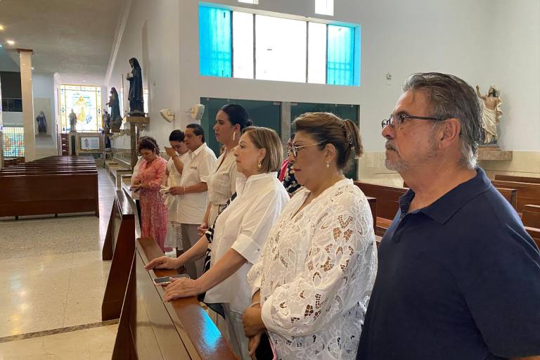 Recibe Evangeline Gastélum Caro las aguas del bautismo