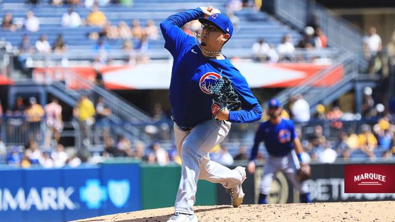 El mexicano Javier Assad tiró siete sólidas entradas para ayudar al triunfo de los Cachorros.