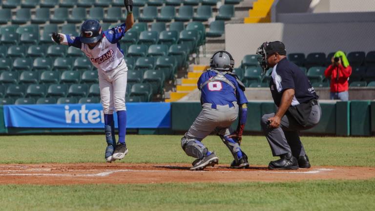 El bateo de Dominicana hizo lo necesario para lograr su primera victoria del torneo.