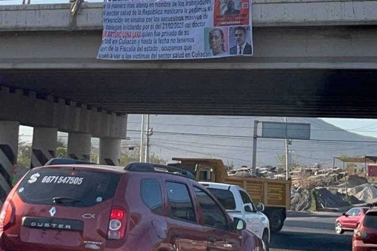 Hallan manta dirigida a Claudia Sheinbaum y a Harfuch en puente de Culiacán