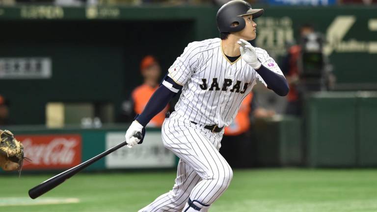 Shohei Ohtani lució en el montículo y en el cajón de bateo para Japón.