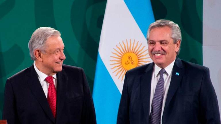 Alberto Ángel Fernández con López Obrador.