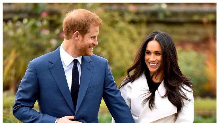 El príncipe Harry y su esposa Meghan.