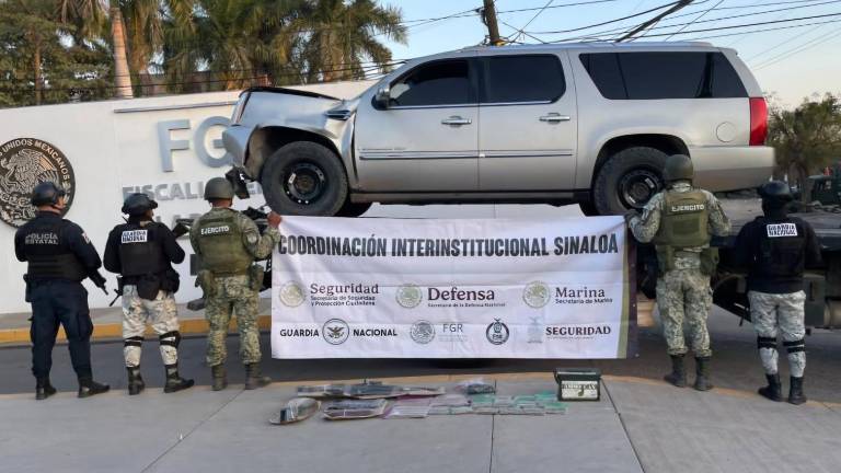 Entre lo asegurado está una camioneta marca Cadillac, línea Escalade, blindada.