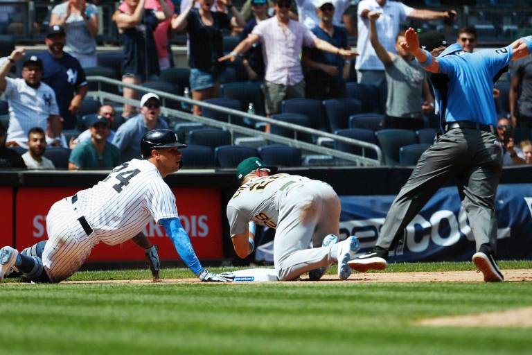 Yanquis termina juego con triple play para vencer a Atléticos