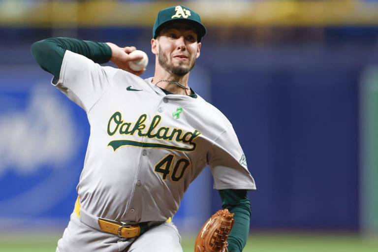 Mitch Spence coqueteó con el no-no y Atléticos blanquearon a Rays