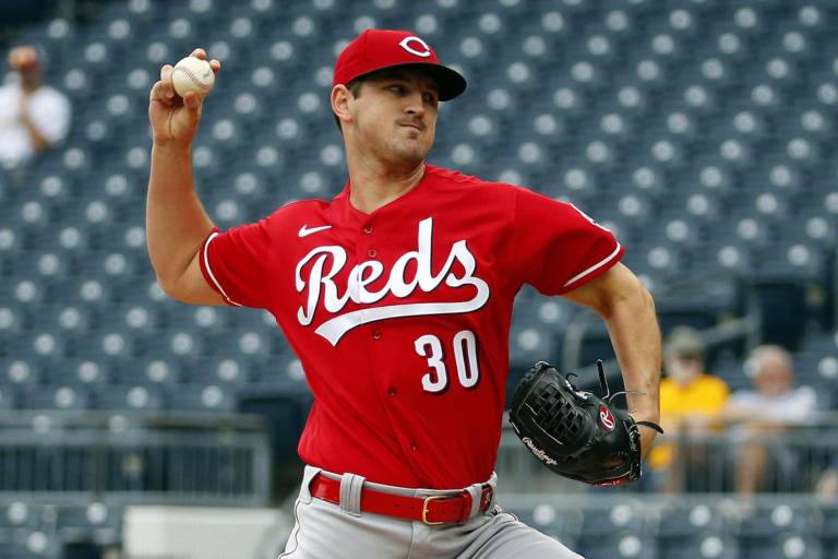 Rojos ganan y ponen presión en el Comodín