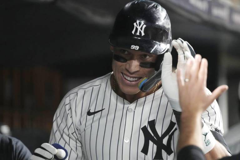 Yanquis doblegan a Rockies a fuerza de jonrones y joya de Rodón