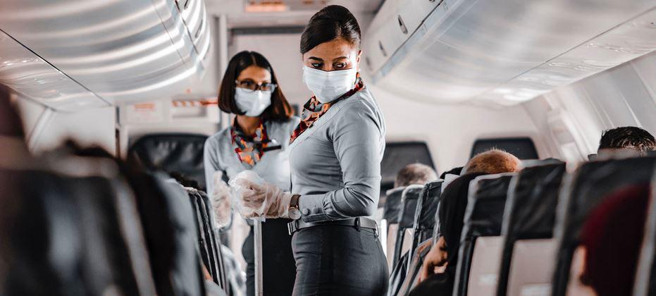 $!Pasajeras en un avión durante la pandemia de Covid-19.