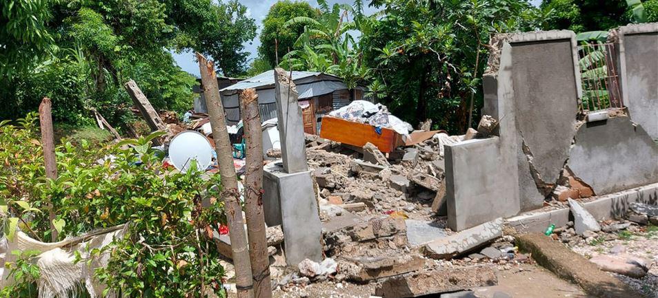 $!El terremoto de 7,2 grados de magnitud que asoló a Haití fue seguido por la tormenta tropical Grace, lo que aumentó la destrucción.