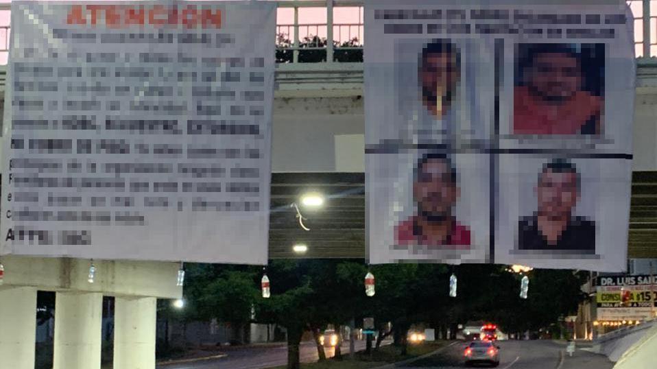 $!Amanecen lonas en Culiacán con amenazas a delincuentes